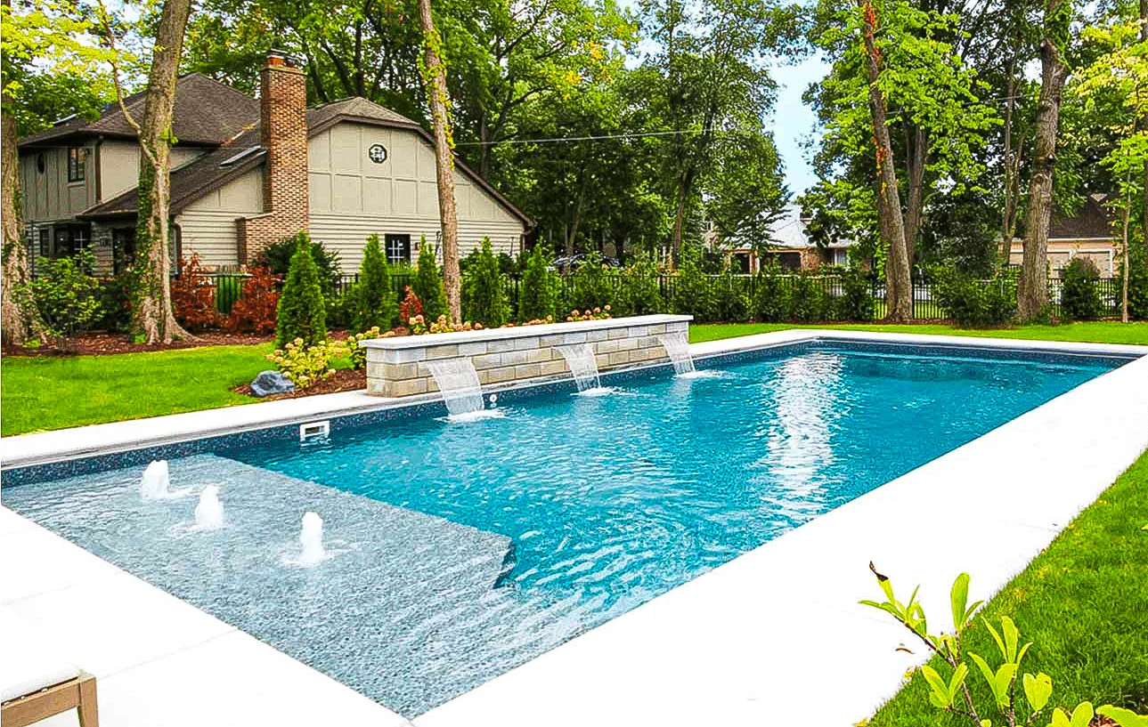 A custom-built backyard pool by Custom Pools of Mahomet