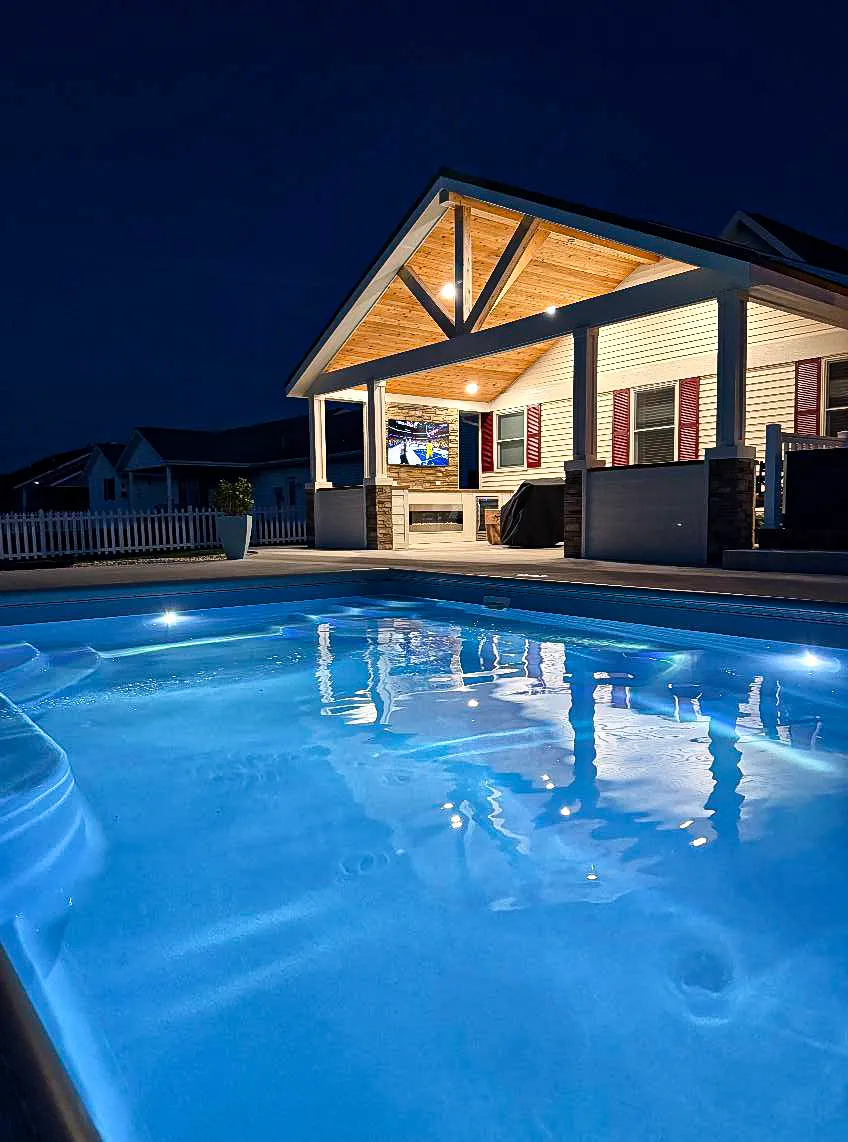 backyard pool installation near Rantoul Illinois with twilight lighting
